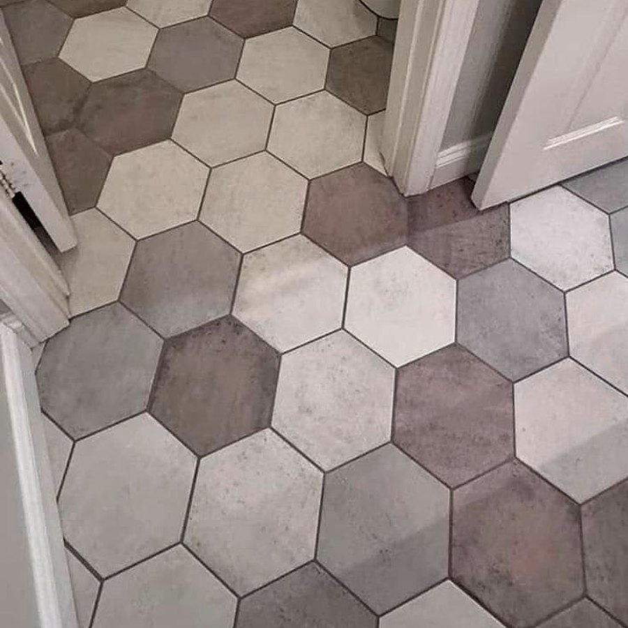 Close-up of large grey and white hexagon floor tile